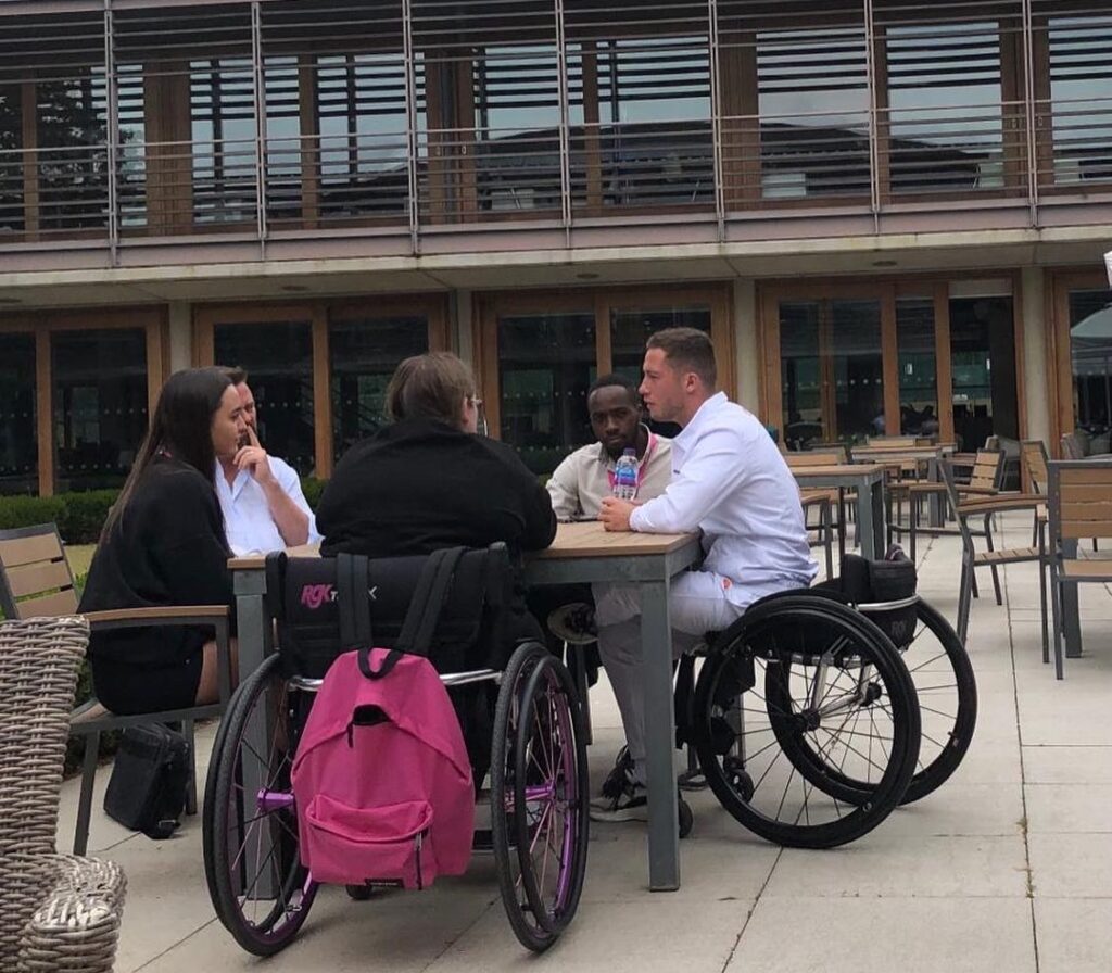 Alfie Hewett talks to reporters at a round table in the outside area at the National Tennis Centre