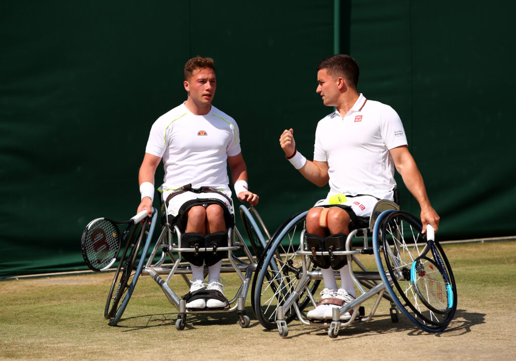 Gordon Reid and Alfie Hewett celebrate after a particularly good shot in the 2021 Wimbledon final